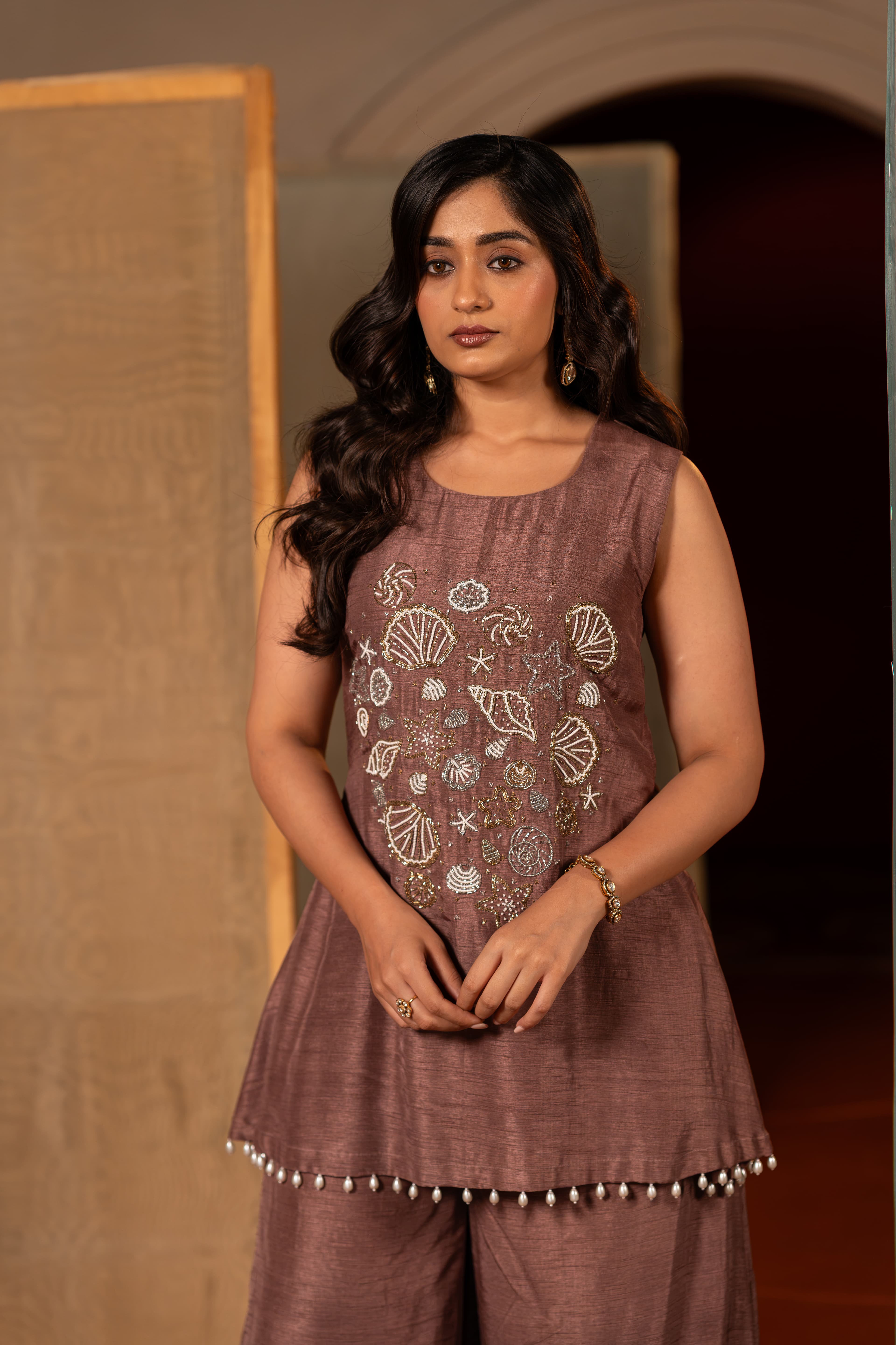Craftsmanship detail — Mocha Mousse Indo-Western Set with western seashell inspired handwork.
